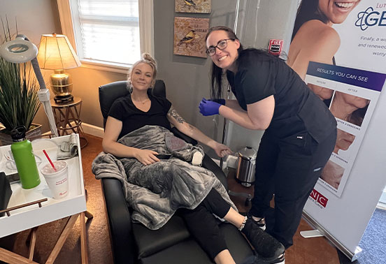 Patient getting an IV therapy at Sunflower Spa